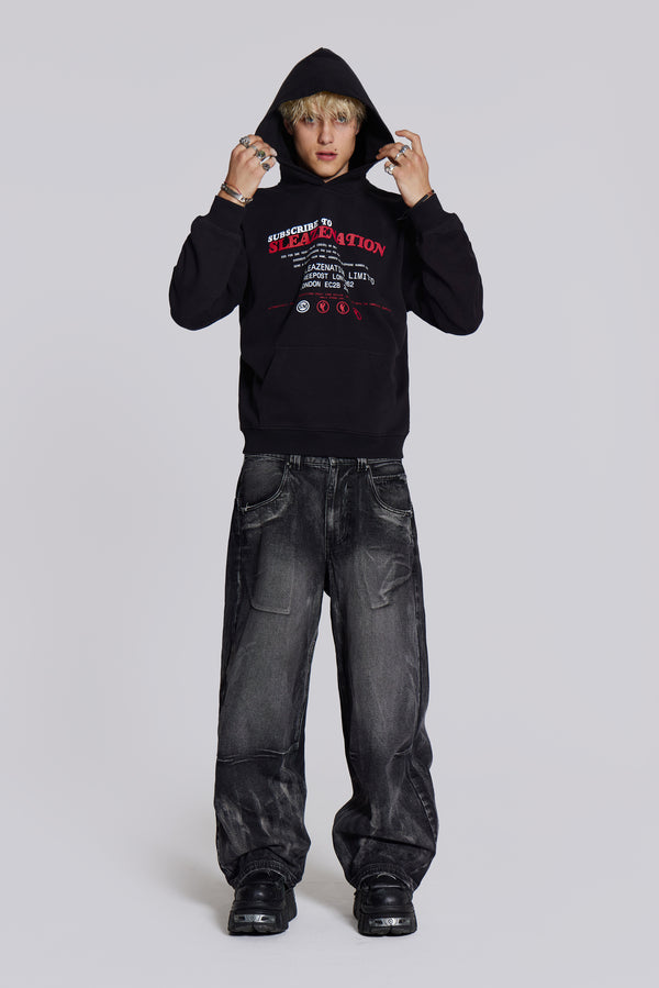 Male model wearing black Sleazenation graphic printed hoodie.