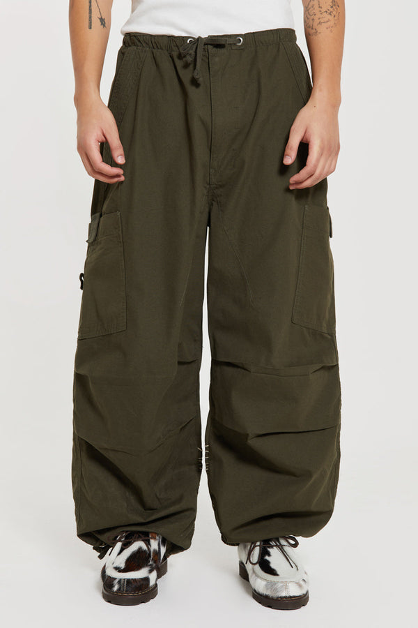 Men's khaki green cargo parachute pants featuring 'Scene' embroidery
