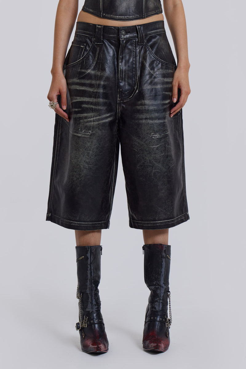 Introducing the Ash Shorts - crafted from a faux leather PU fabric, these shorts feature a unique heavy acid wash finish. With five pocket jean styling and a Colossus jort fit.