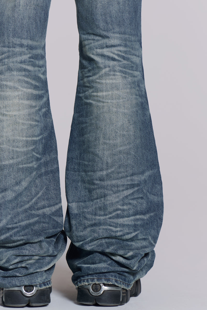 Mid Blue Distressed Creased Drift Flared Jeans