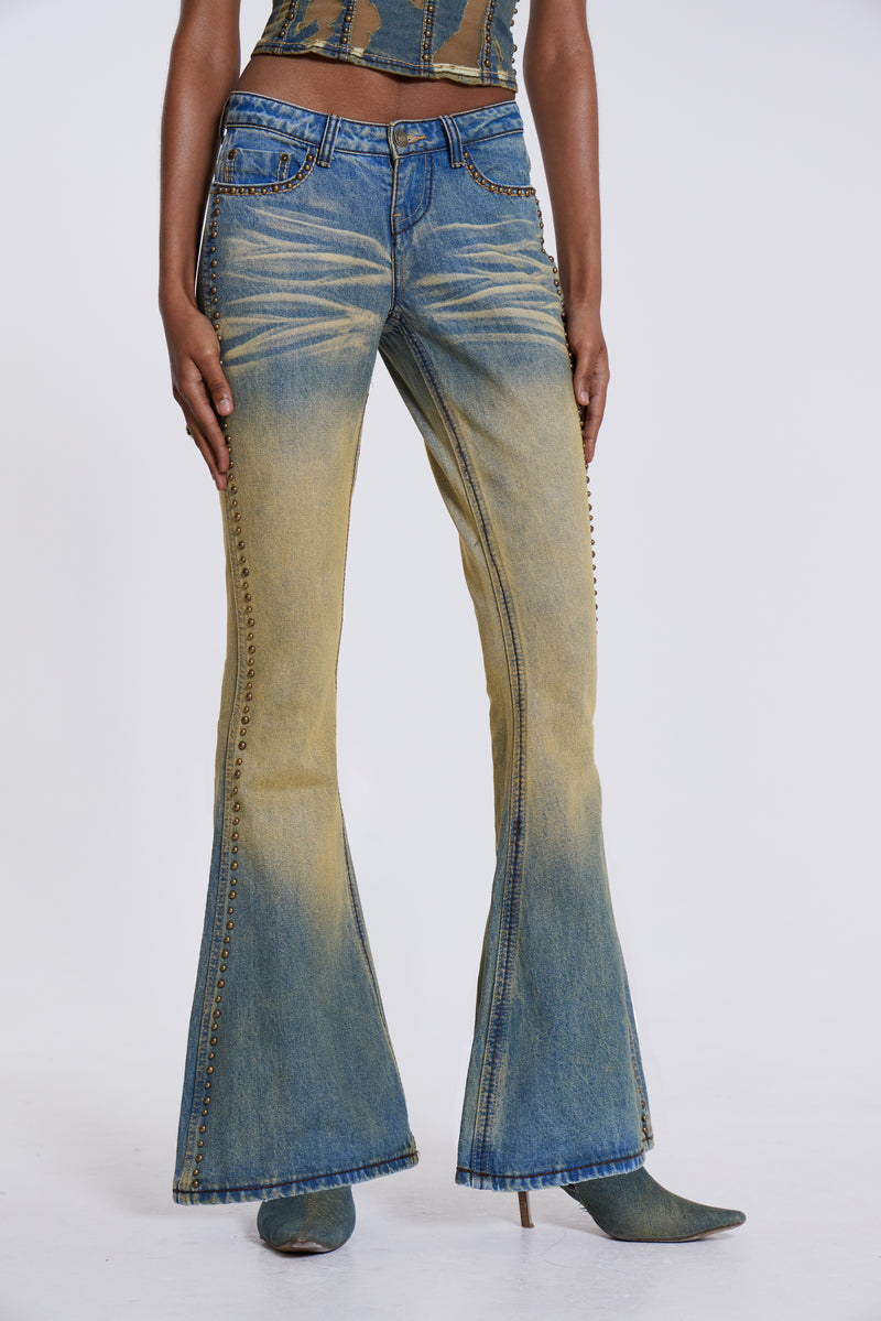 Yellow Sand Wash Flared Low Rise Jeans | Jaded London
