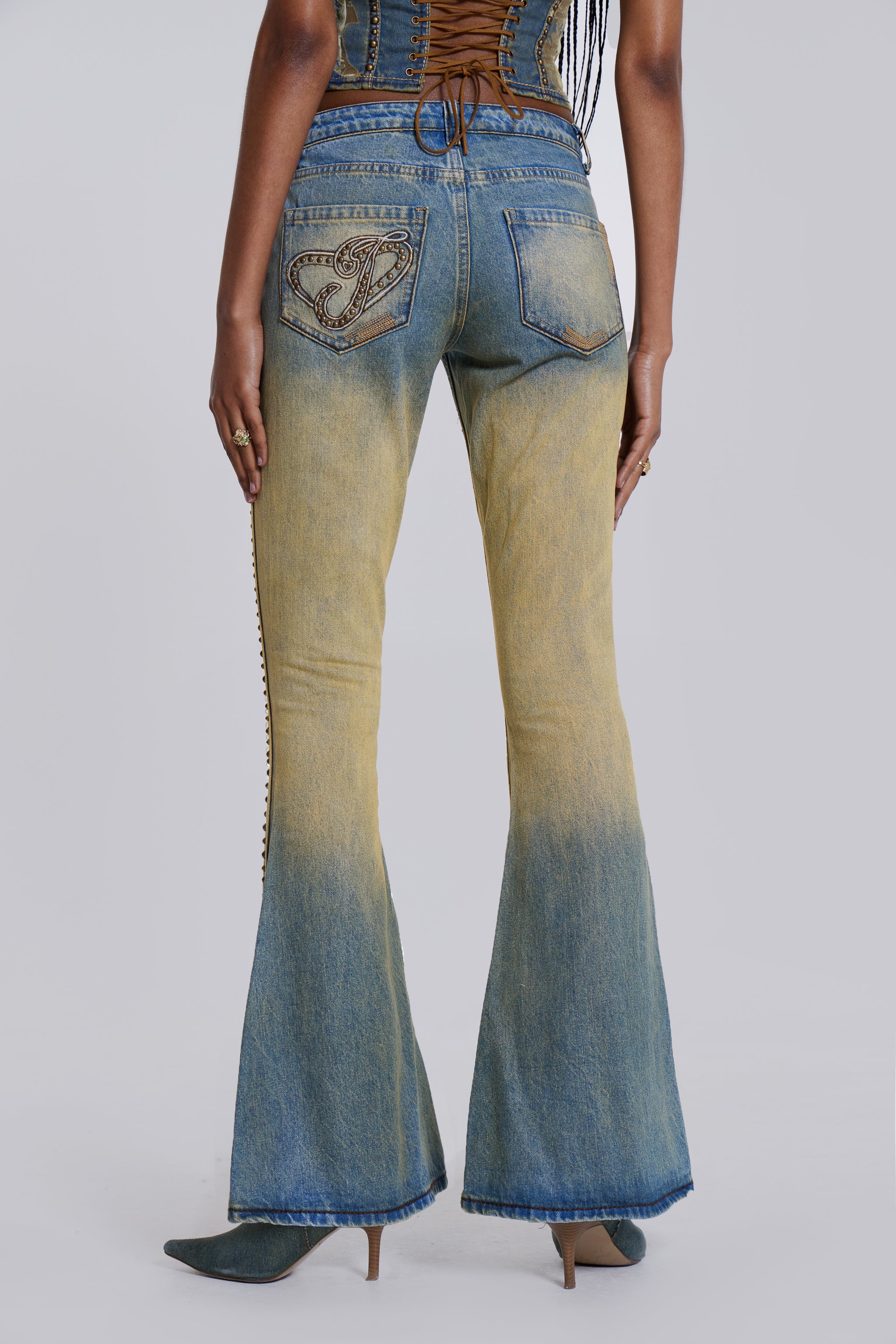 Yellow Sand Wash Flared Low Rise Jeans | Jaded London