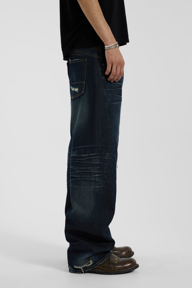 Indigo Distressed Baggy Twisted Seam Jeans