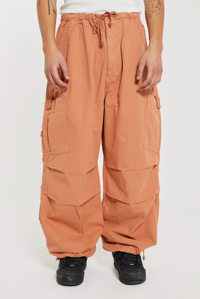 Terracotta Parachute Cargo Pants in an oversized fit