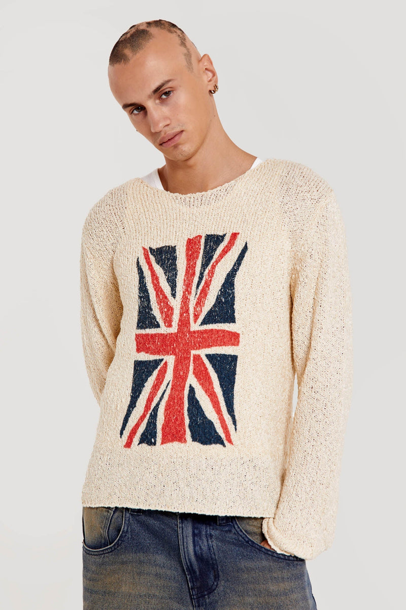 Male wearing white Union Jack printed long sleeve loose knitted crew neck jumper. 