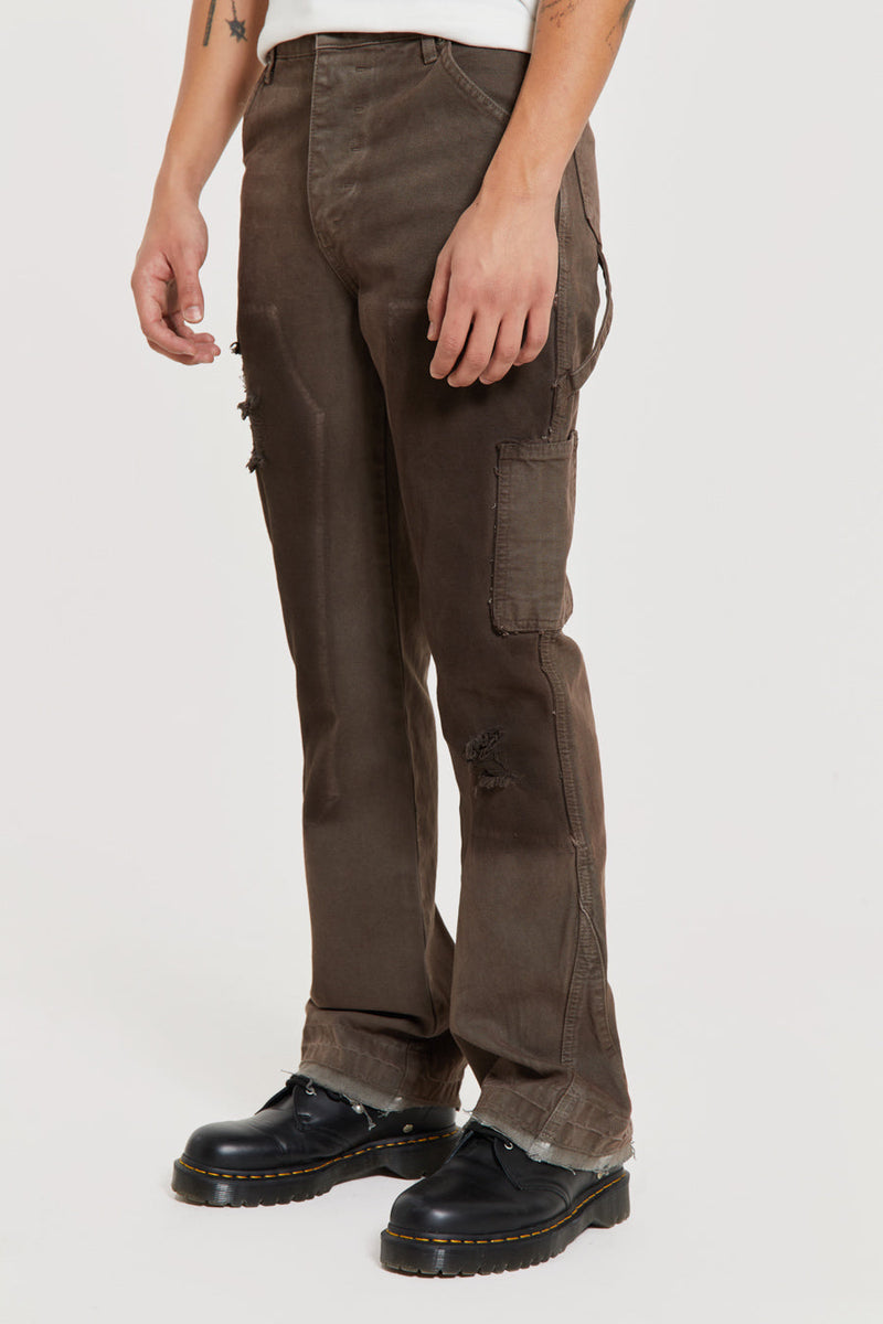Male wearing Vintage Brown Rodeo Flared Carpenters.