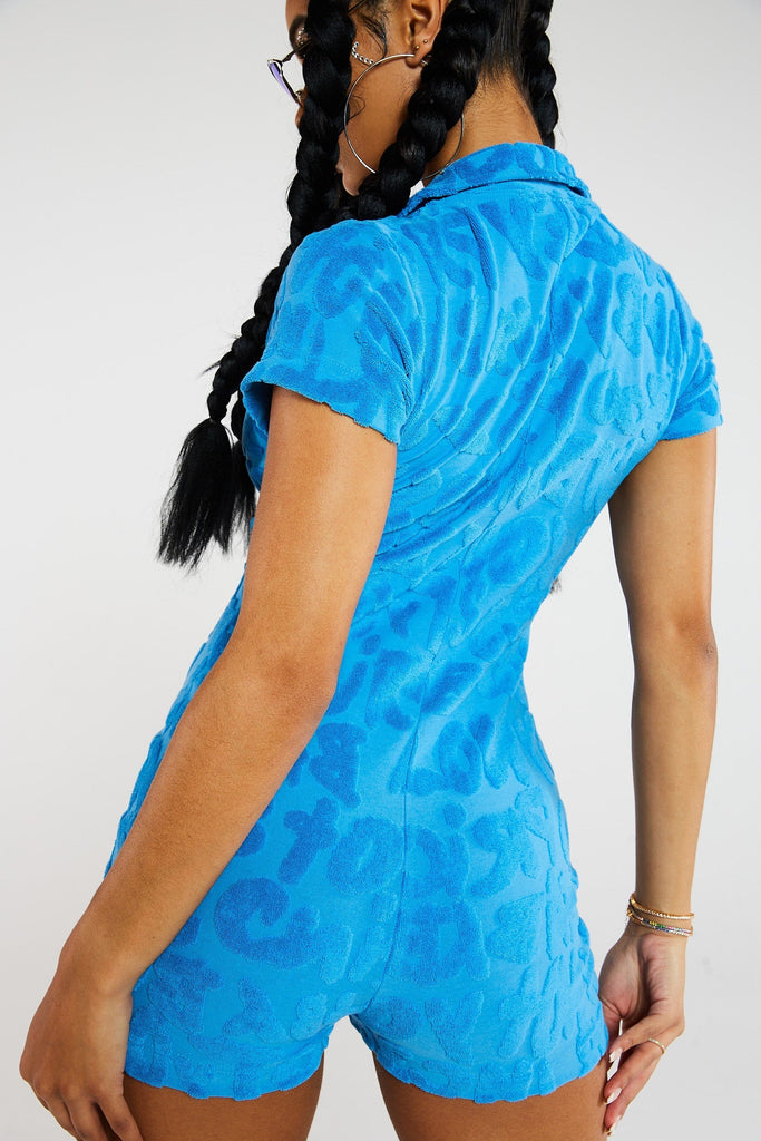 Blue squiggle embossed towel button up front playsuit. 