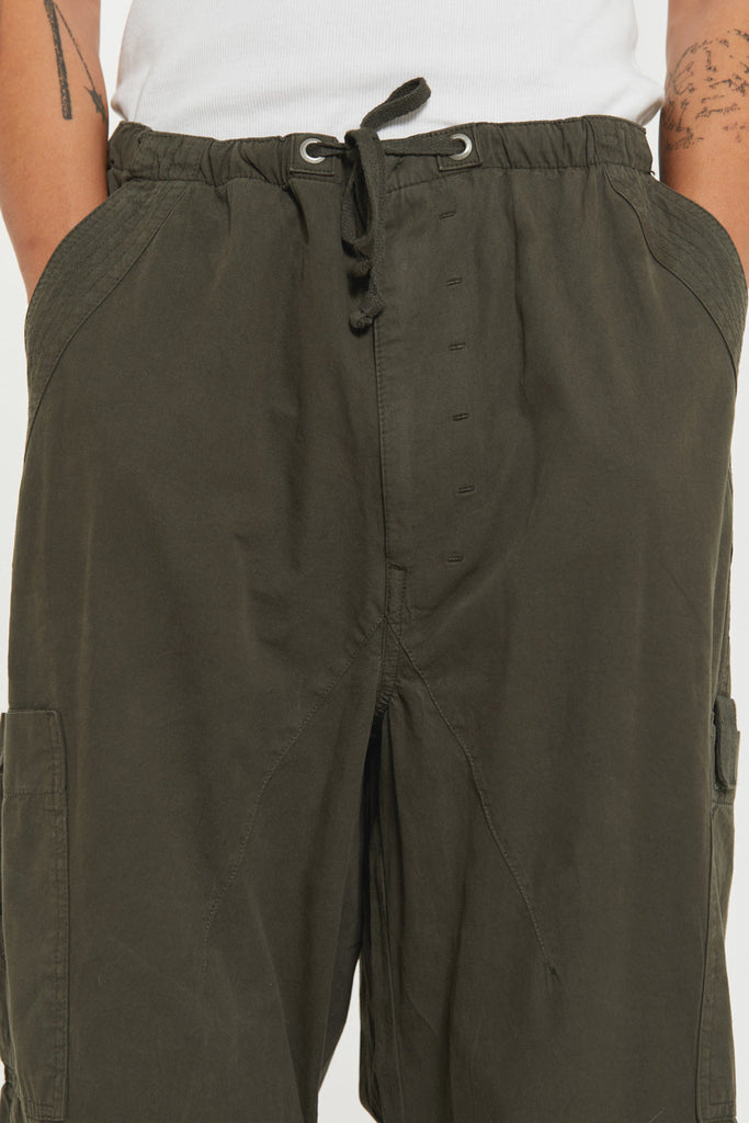 Unisex khaki green oversized fitted parachute style cargo trousers with six pocket styling. 