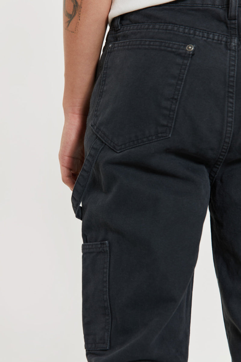 Male wearing Washed Black Carpenter Jeans With Inserted Panel. 