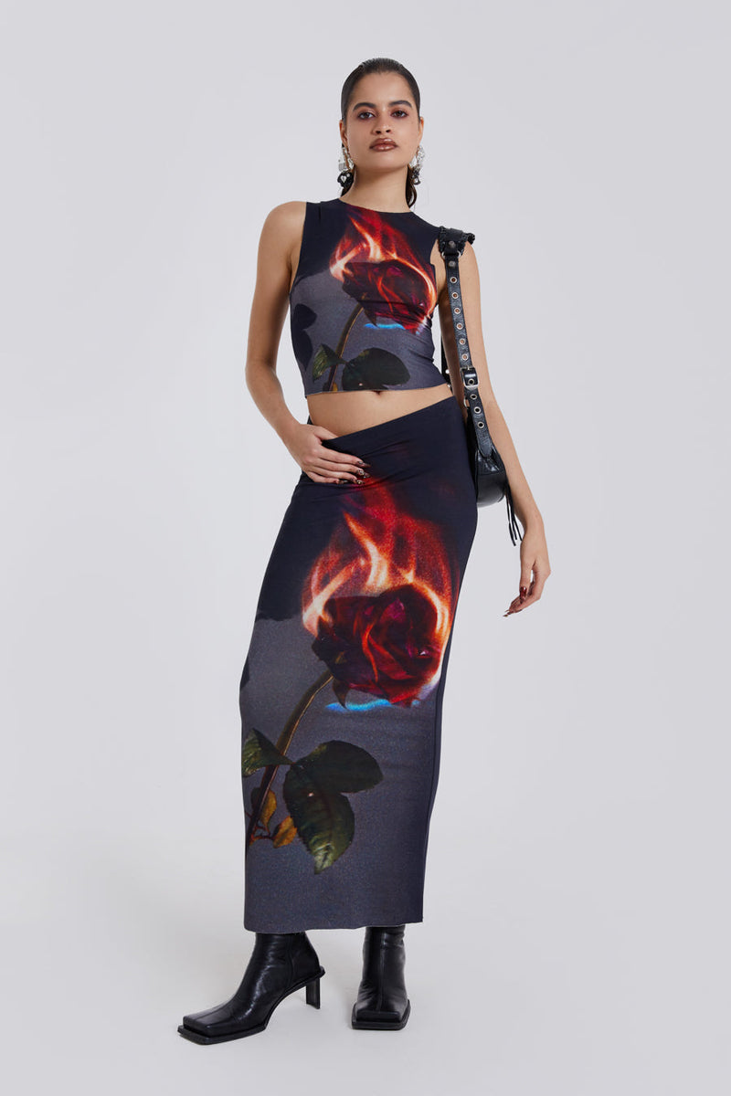 Female model wearing Flaming Rose Raw Edge Tank Top. Styled with the matching maxi length skirt. 
