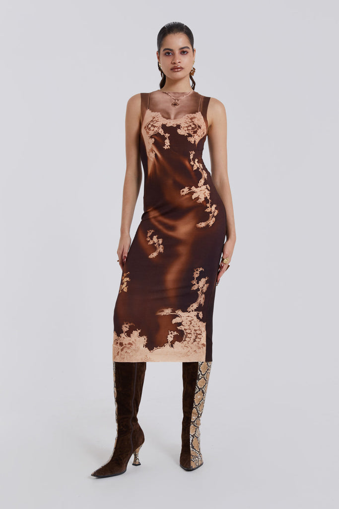 Female model wearing a brown Illusion Lace Slip Maxi Tank Dress. Styled with heels. 