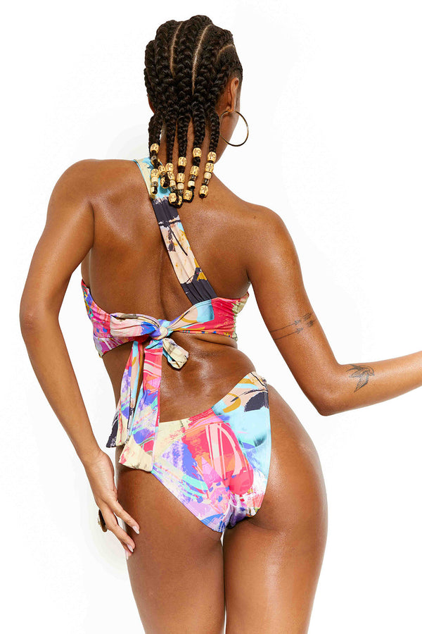 Female model wearing Mix Statue Print V Front High Leg Bikini Bottoms. Styled with the matching bikini top.  